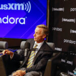 A photo of Governors Bill Haslam and Phil Bredesen in conversation while recording an episode of the You Might Be Right podcast