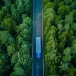 Tractor Trailer driving through forest