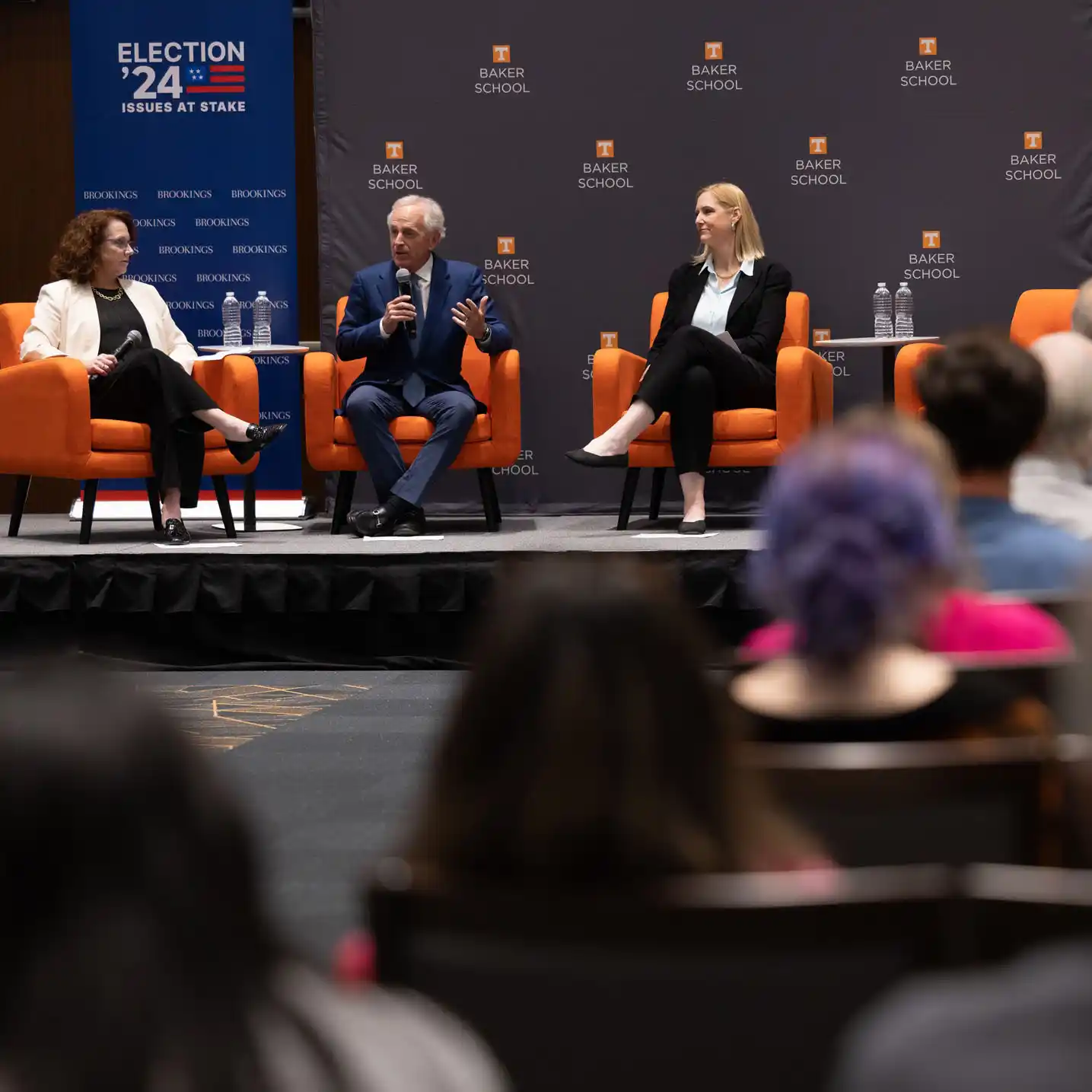 Suzzane Maloney, Bob Corker, and Krista Wiegand participate in a fireside chat at the University of Tennessee.