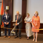 A photo of the ribbon cutting at the Baker School dedication event