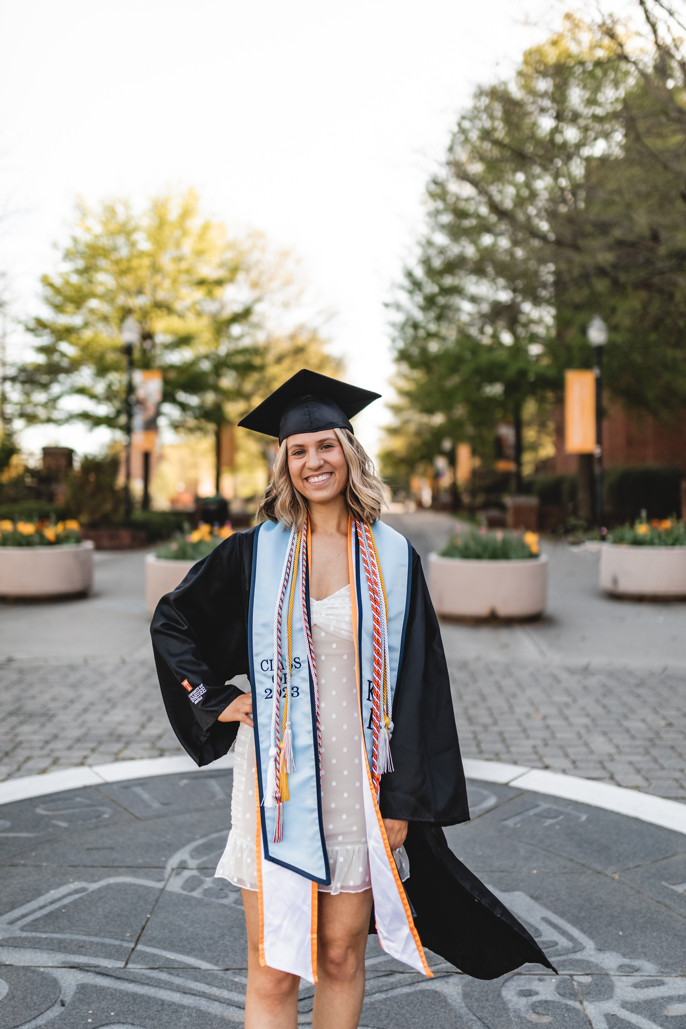 Headshot of Cameron Fox in graduation regalia
