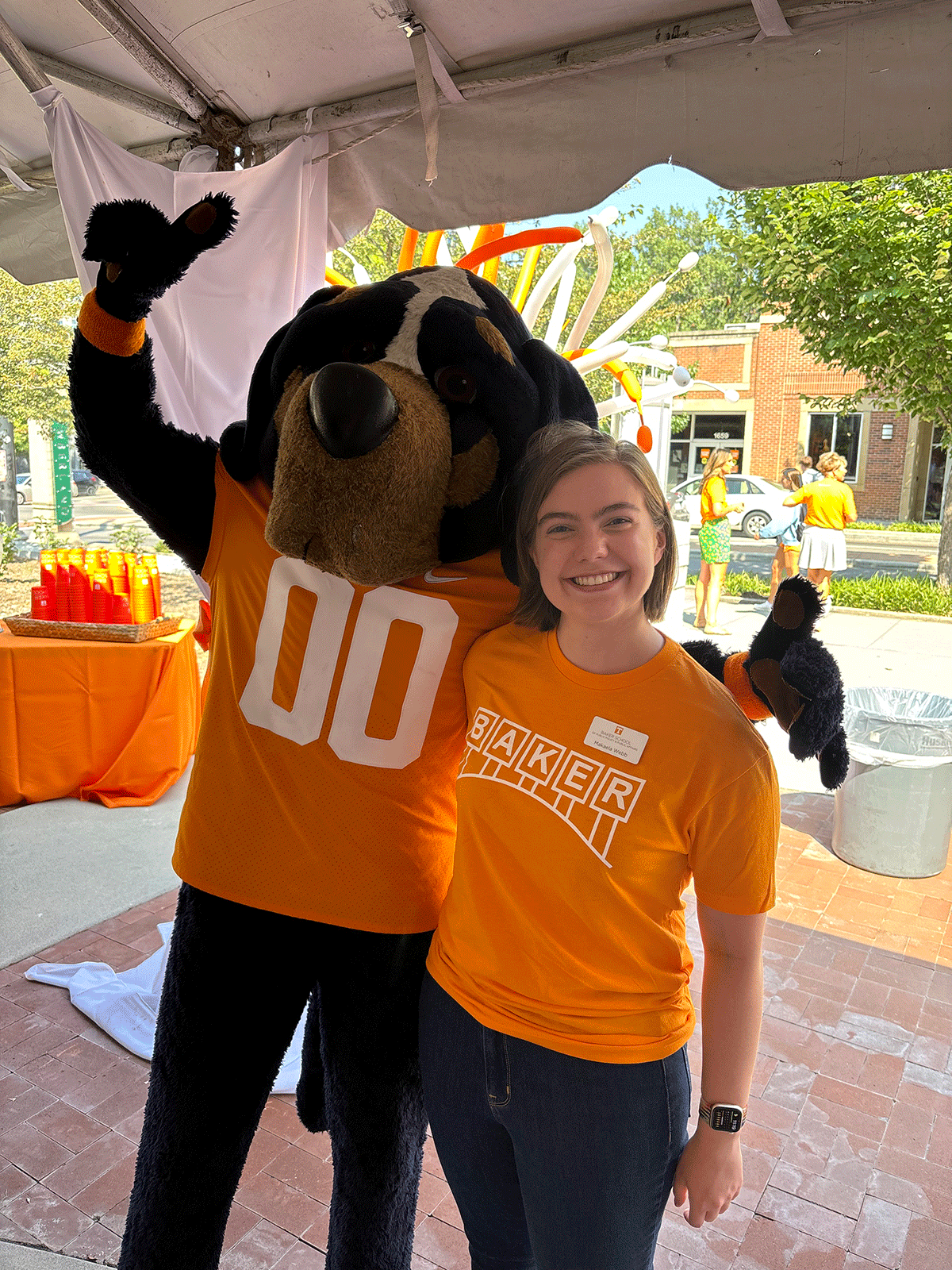 Photo of Makaela Jo Webb and Smokey the mascot
