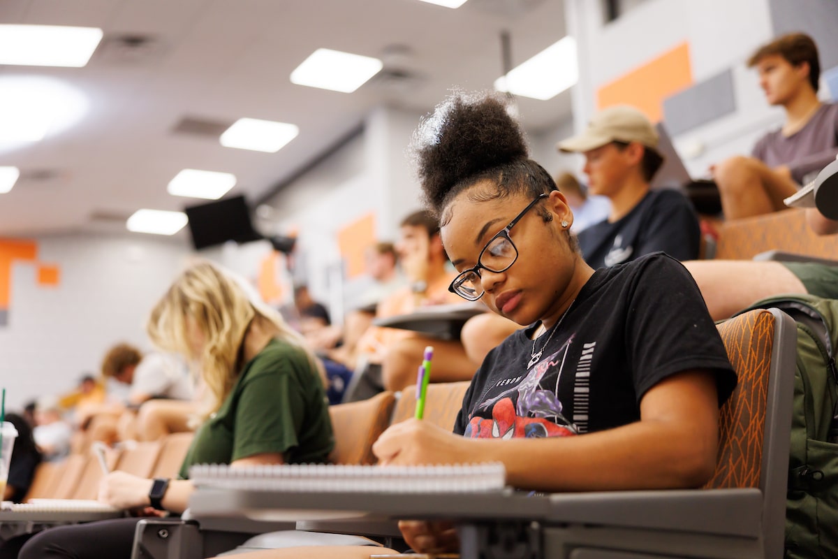 Students listen to a lecture during a fundamentals of Soil Science class inside the Walters Academic Building
